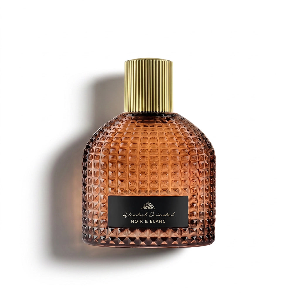 Alrehab Oriental Noir & Blanc perfume bottle with a gold cap on a white background.